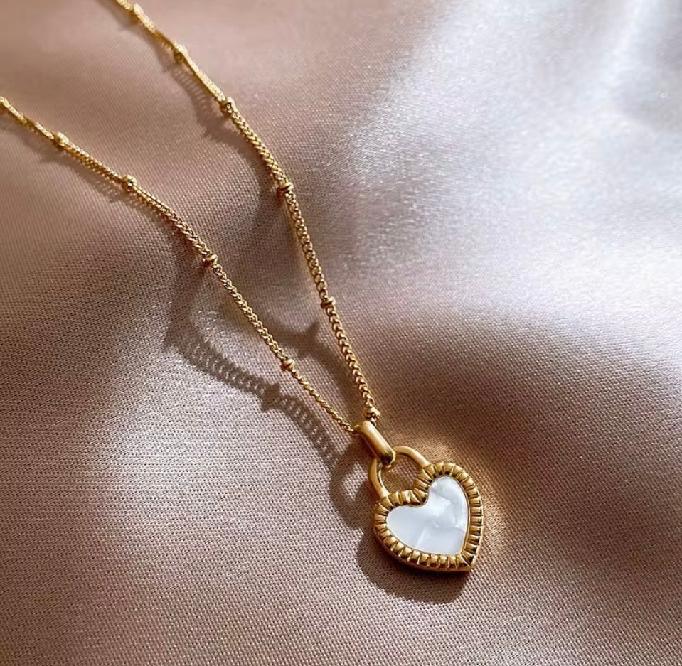Delicate Double Sided Black and White Heart Pendant on an 18 Inch Necklace
