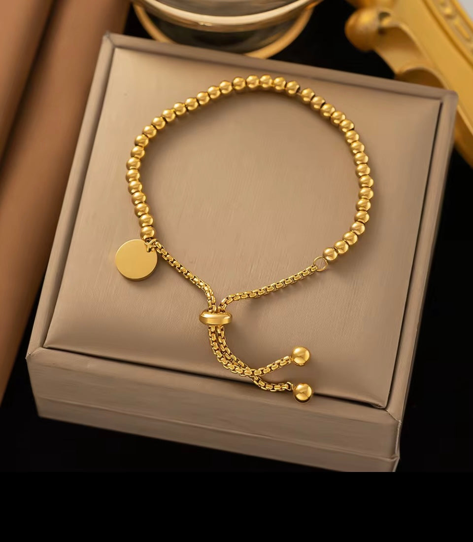 Gold and Stainless Steel Beaded Slide Locking Bracelet