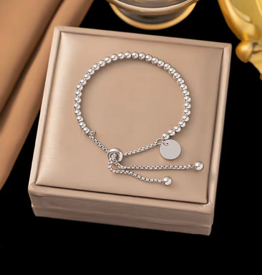 Gold and Stainless Steel Beaded Slide Locking Bracelet